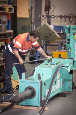 man working with heavy machinery