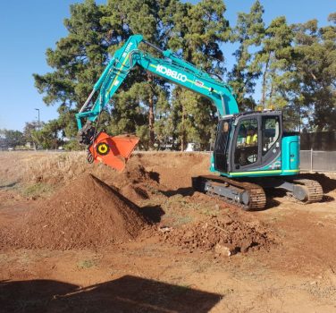 blue digger with orange shovel